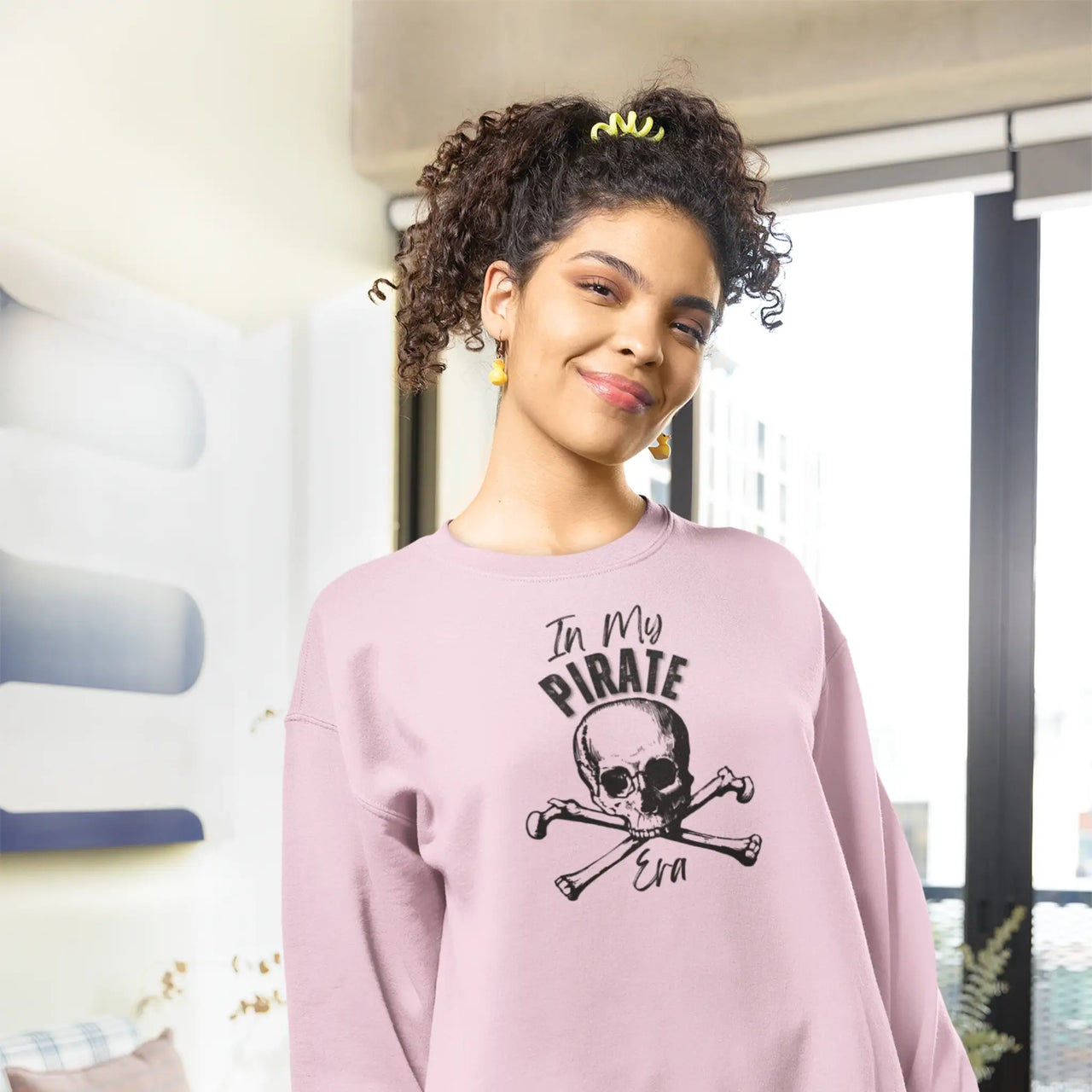 woman posing wearing a Pink In My Pirate Era sweatshirt