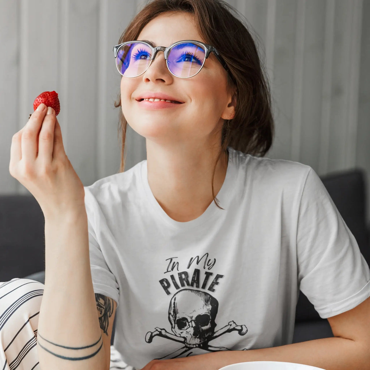 woman wearing a light grey in my pirate era tee 