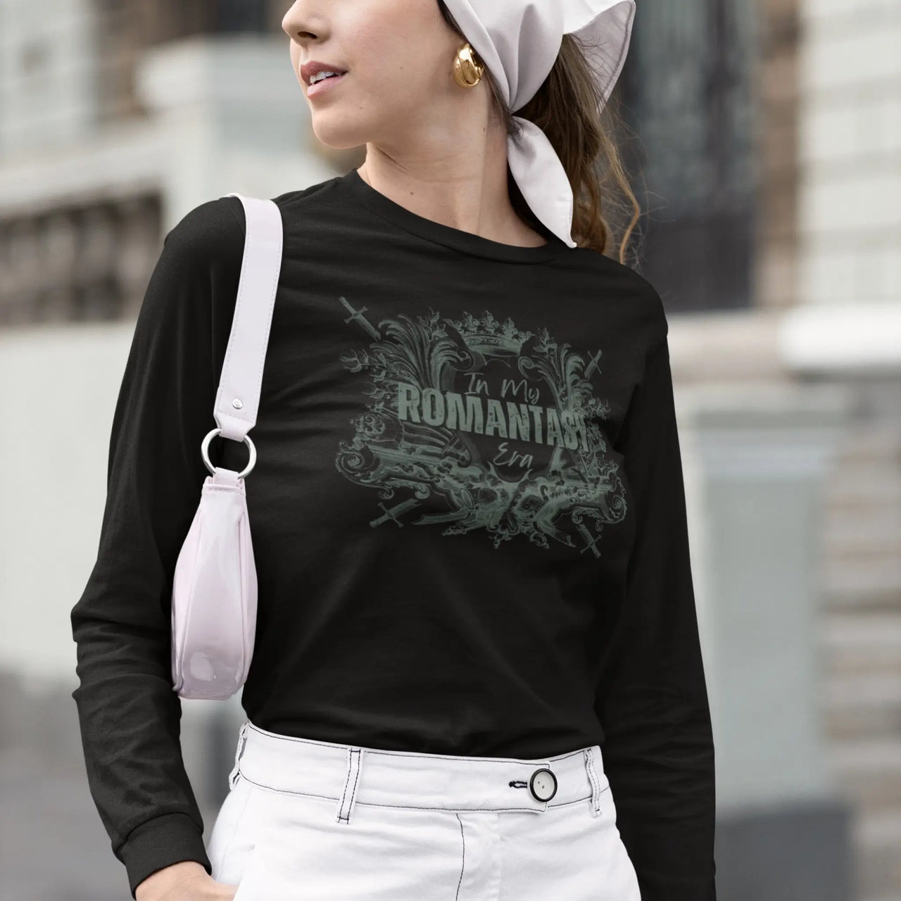 woman wearing a In My Romantasy Era shirt on black with green text