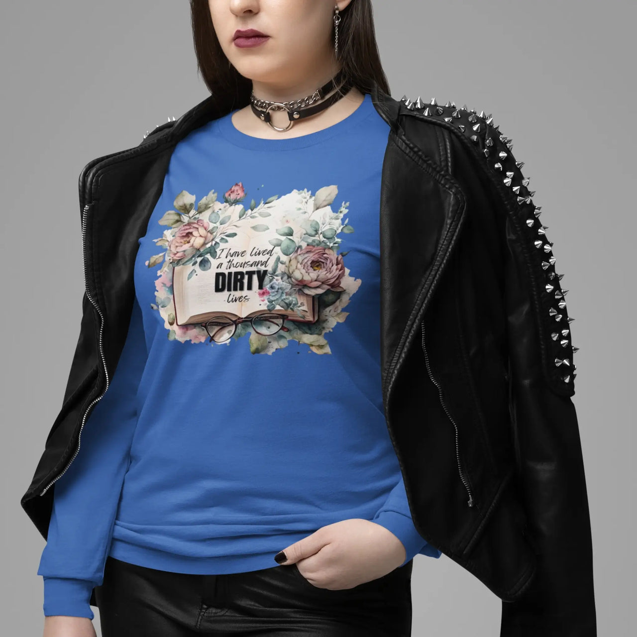 woman wearing a 1000 dirty lives long tee in blue version C