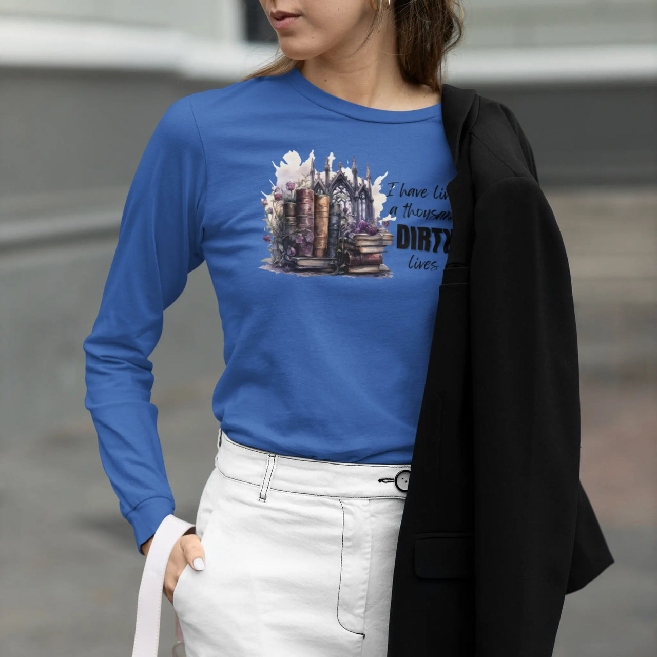 woman wearing a 1000 dirty lives long tee in blue version B