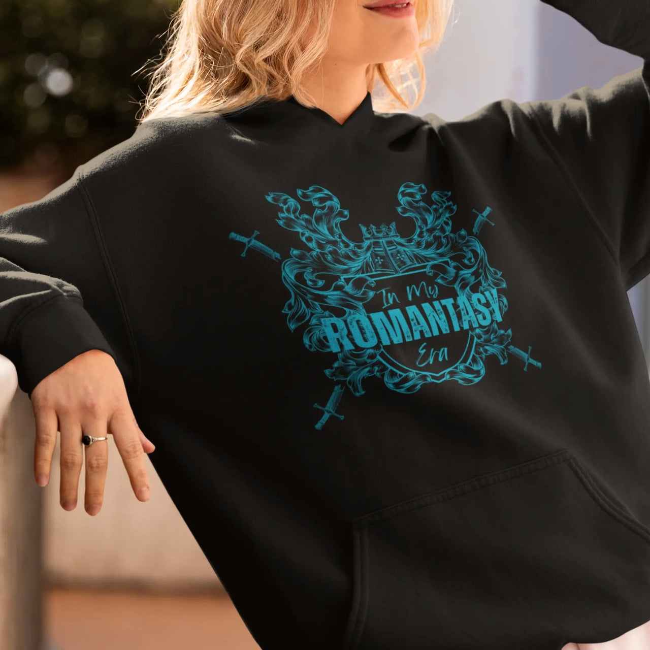 woman wearing the Black In My Romantasy Era Hoodie V3 Teal Design