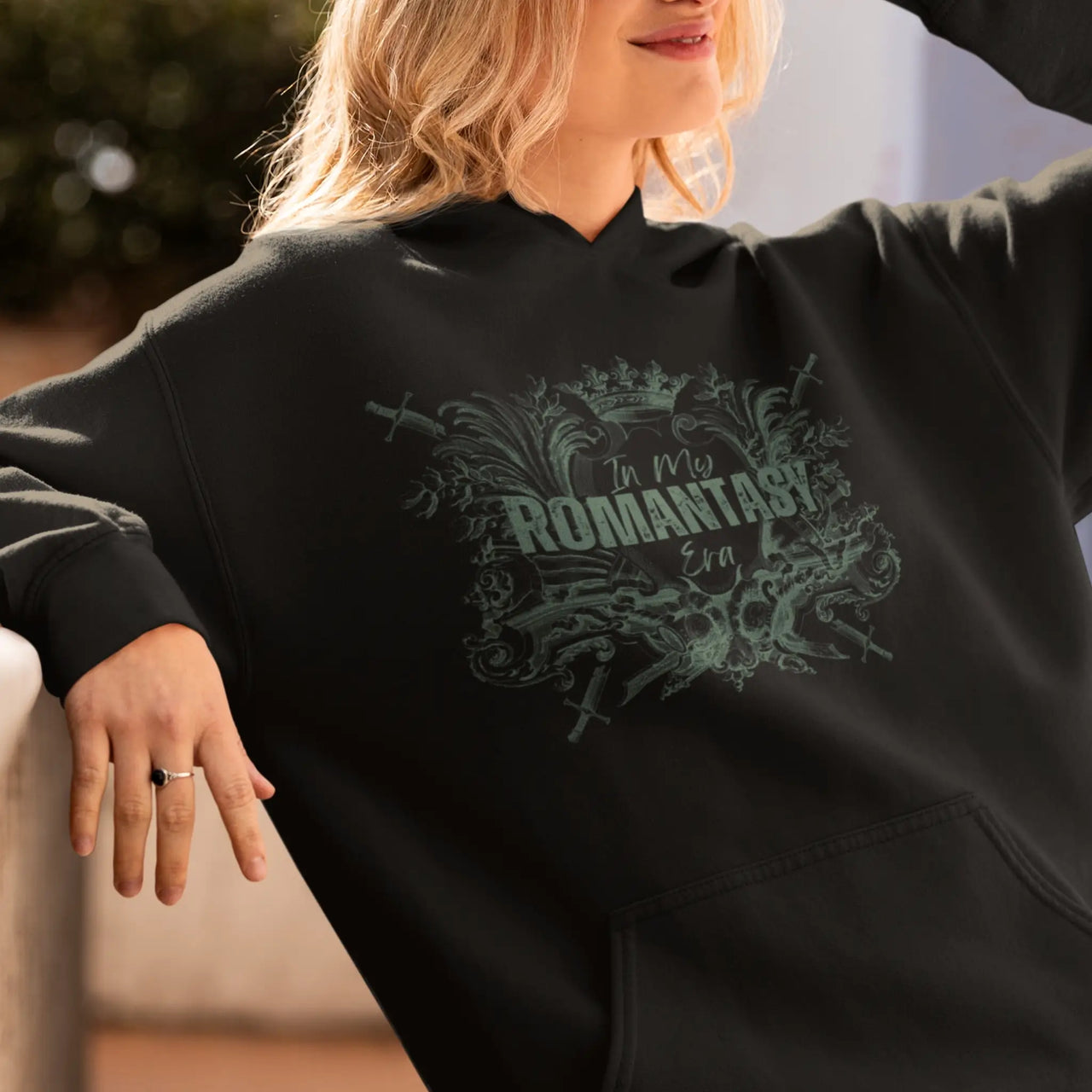 woman wearing the Black In My Romantasy Era Hoodie V3 green Design