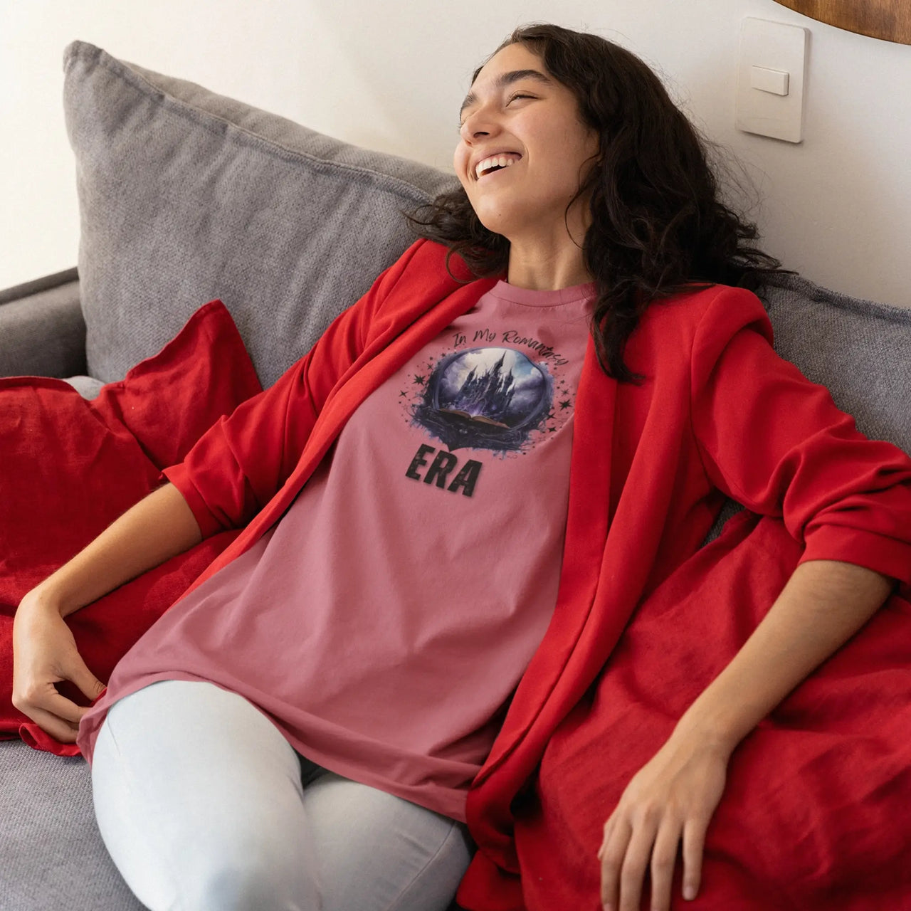 woman relaxing wearing a dark pink In My Romantasy Era T-shirt