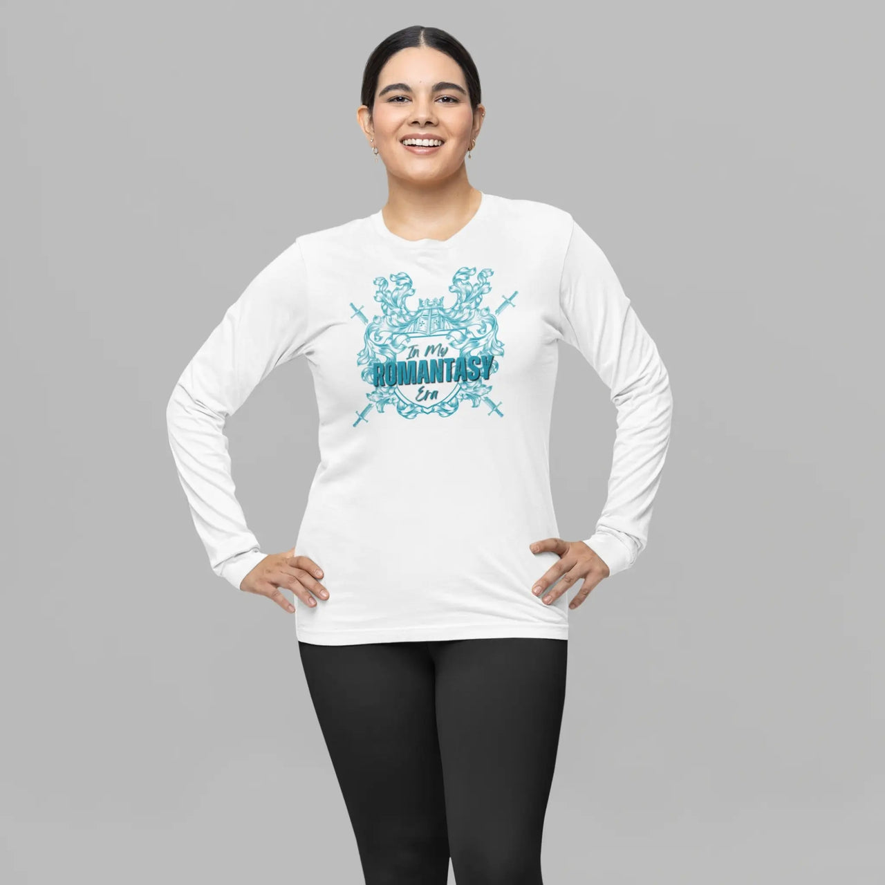 woman wearing a In My Romantasy Era shirt on white with teal text