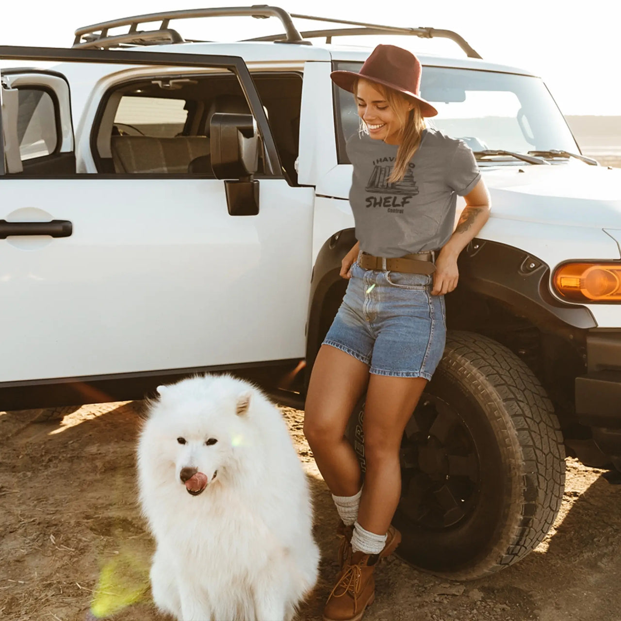 woman wearing a dark grey I Have No Shelf Control T-Shirt