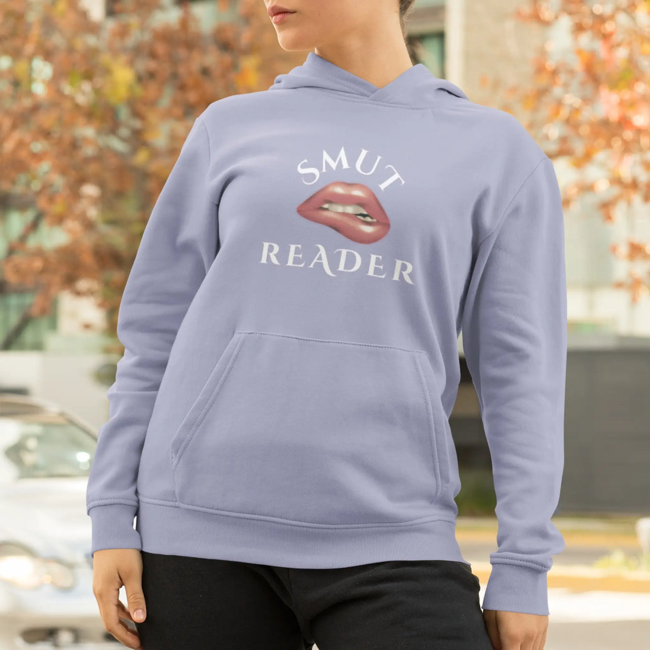 woman wearing Violet Smut Reader Hoodie V2 with white text