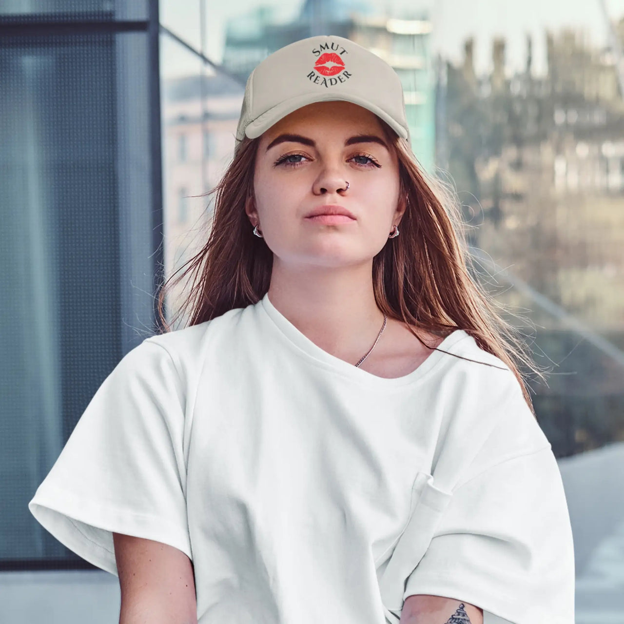 woman wearing a beige smut reader cap