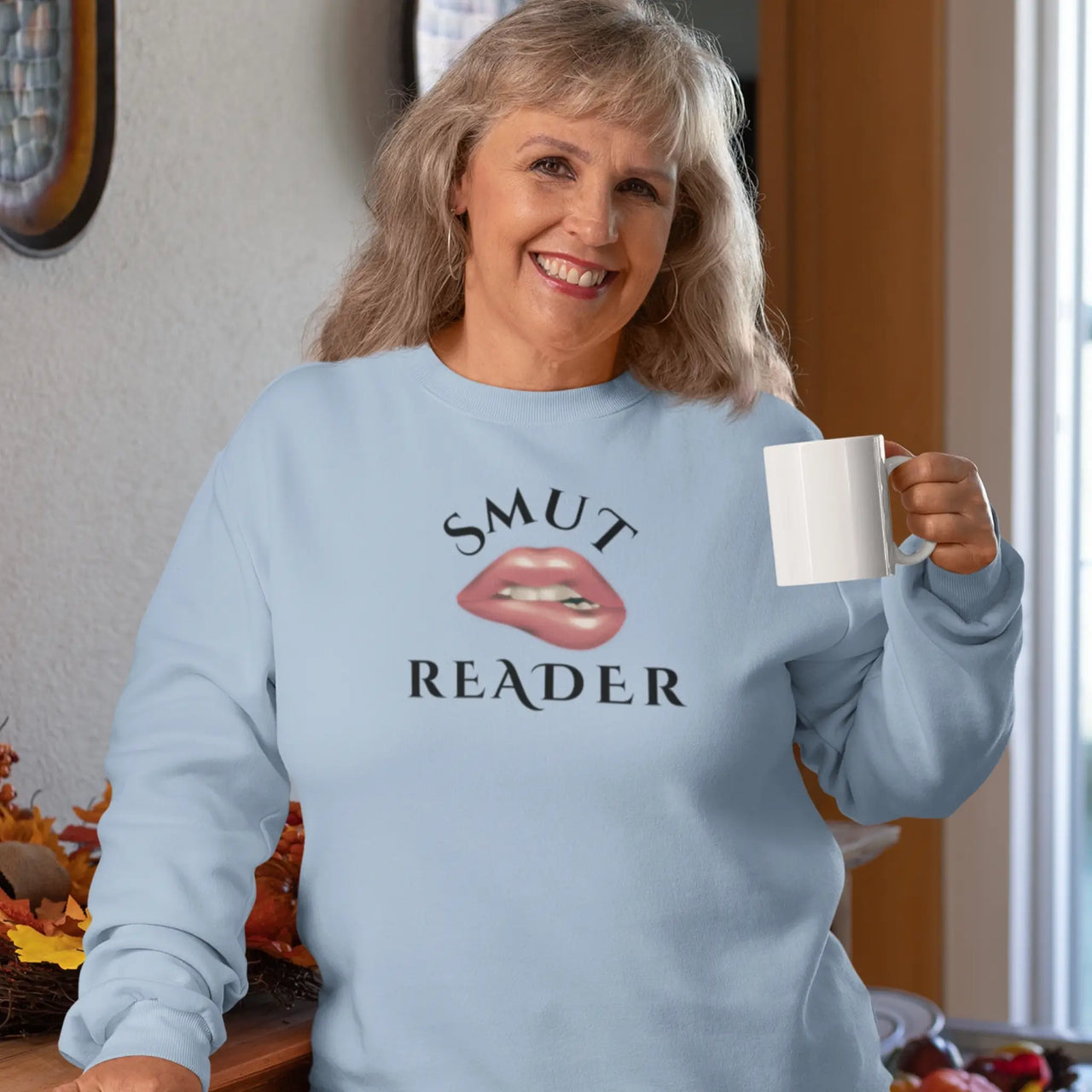 woman wearing the light blue smut reader sweatshirt v2