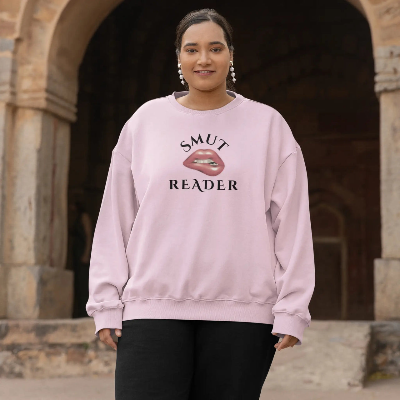 woman wearing the pink smut reader sweatshirt v2