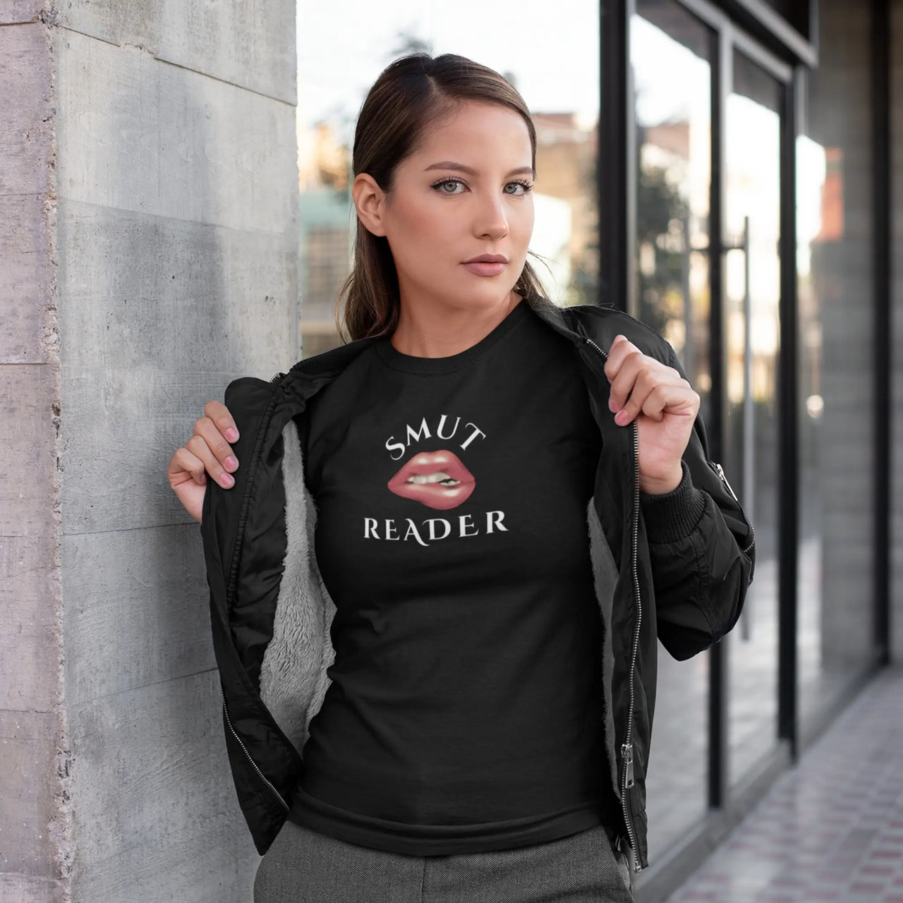 woman wearing a black smut reader v3 tshirt