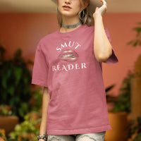 Thumbnail for woman wearing heather dark pink smut reader v3 tshirt with white writing