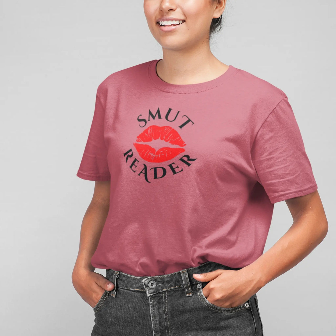 a woman wearing a dark pink smut reader v1 tshirt 