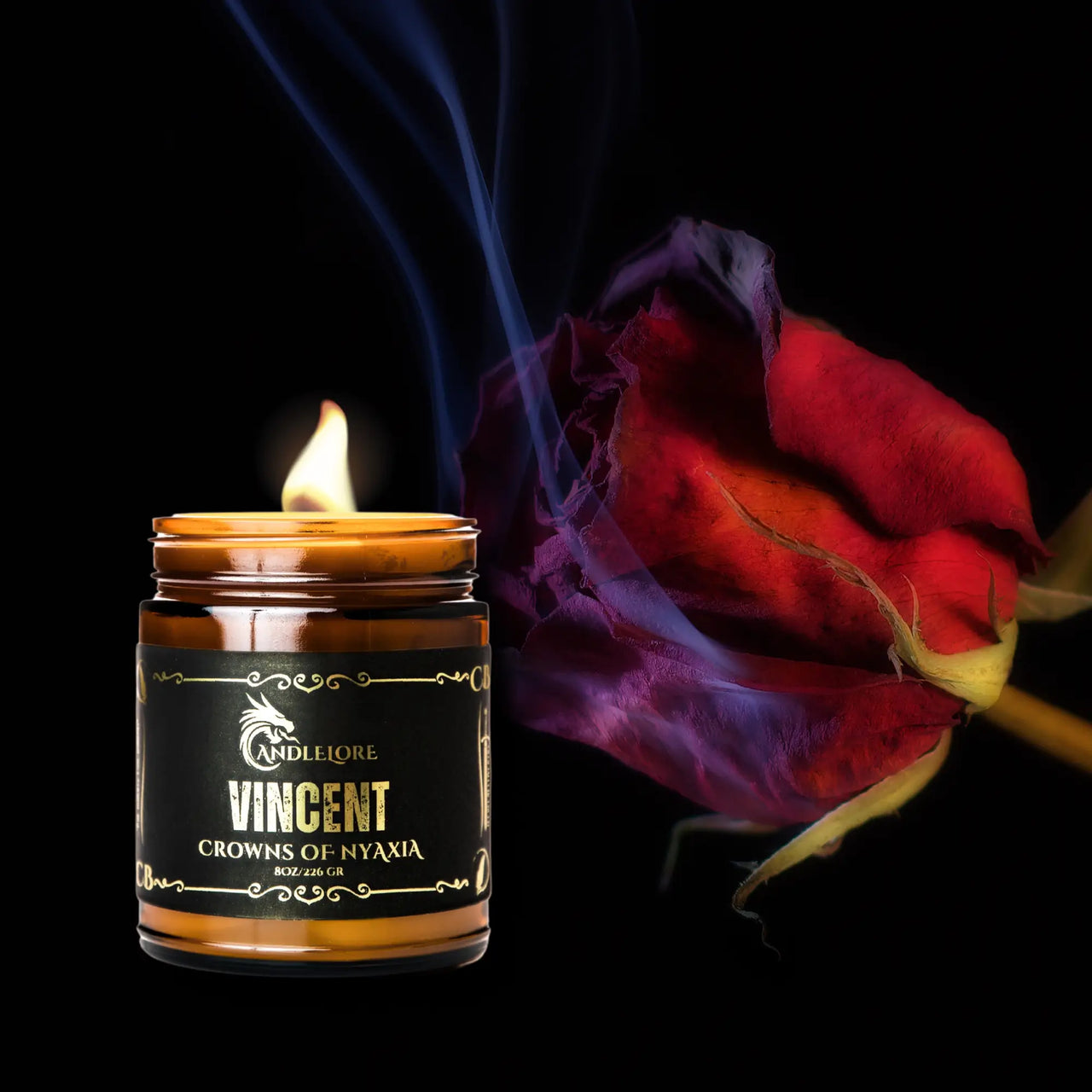 vincent candle next to smoke and rose